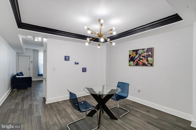 1107 S Carey St, Baltimore, MD 21223 - dining area featuring a chandelier, dark wood finished floors, baseboards, and a tray ceiling