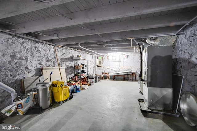 1107 S Carey St, Baltimore, MD 21223 - unfinished below grade area with heating unit and electric panel