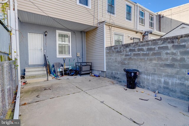1107 S Carey St, Baltimore, MD 21223 - view of patio featuring entry steps
