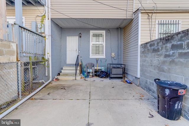 1107 S Carey St, Baltimore, MD 21223 - view of exterior entry featuring a patio area