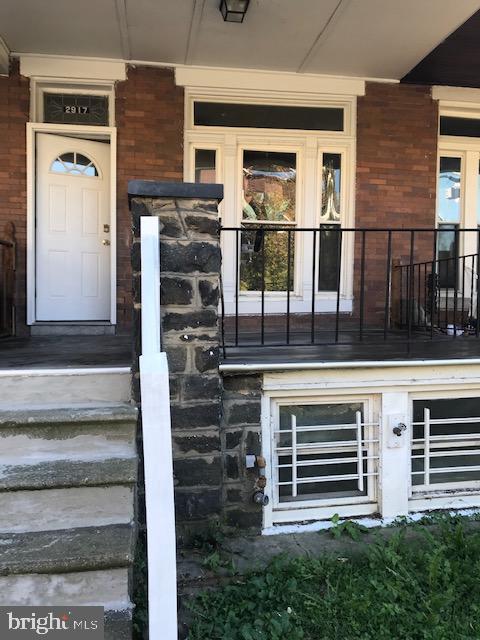 entrance to property with a porch