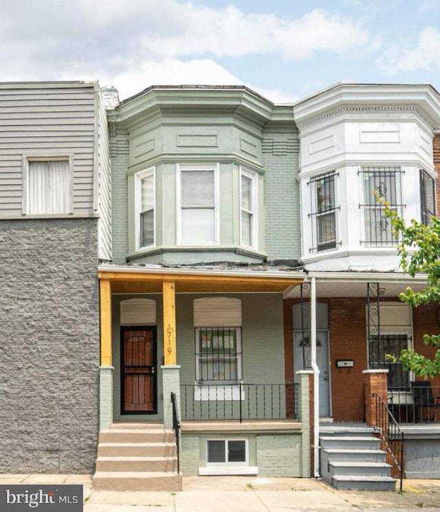 multi unit property featuring covered porch