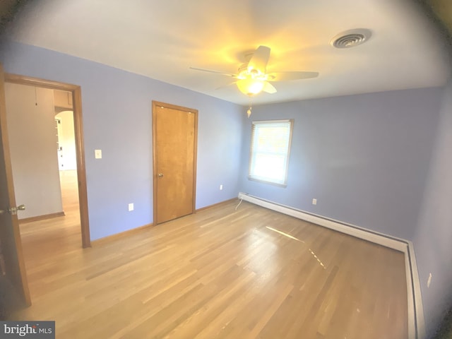 unfurnished bedroom featuring light hardwood / wood-style flooring and ceiling fan