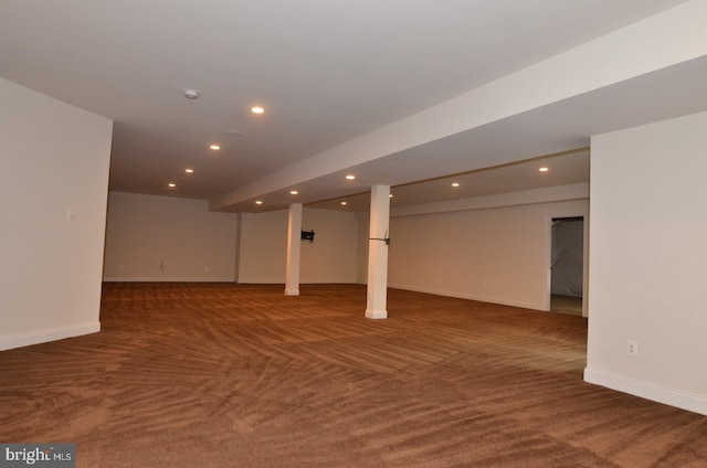 basement with dark carpet