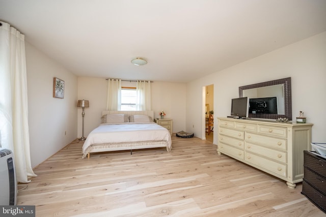 bedroom featuring light hardwood / wood-style flooring