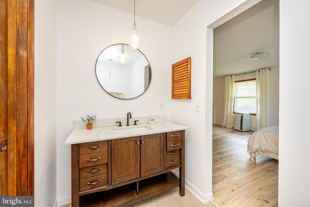 bathroom featuring vanity and wood-type flooring