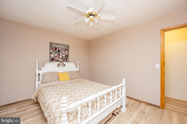 bedroom featuring ceiling fan and light hardwood / wood-style flooring