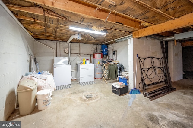 basement with gas water heater and washer and dryer