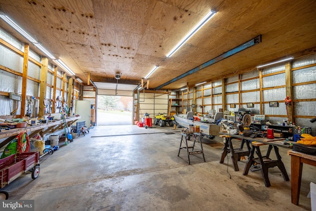 garage featuring a workshop area