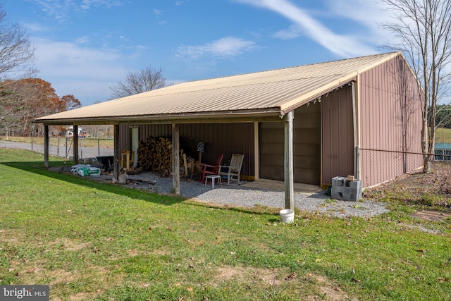 view of outdoor structure with a lawn