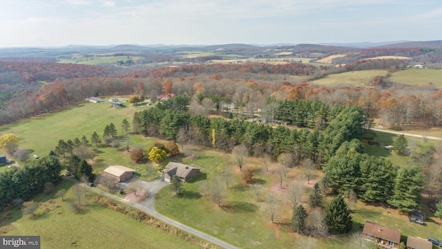 birds eye view of property featuring a rural view