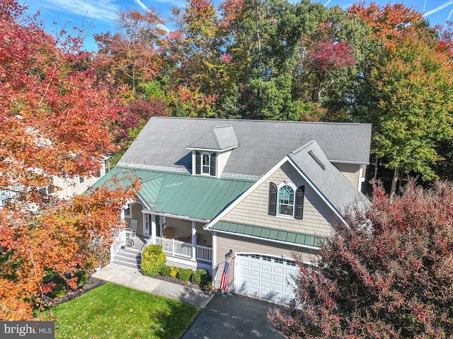 view of front of property with a garage and a porch