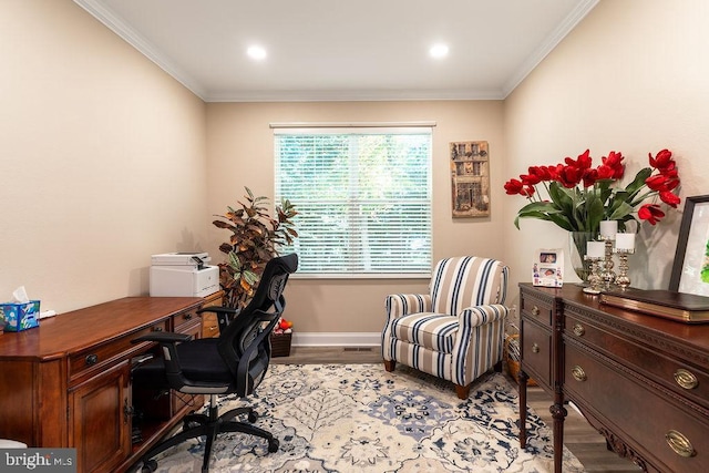 office space featuring light hardwood / wood-style floors and ornamental molding