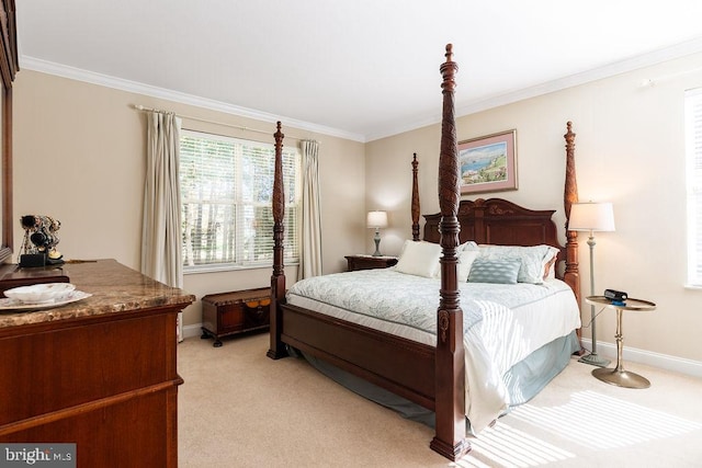 carpeted bedroom featuring crown molding