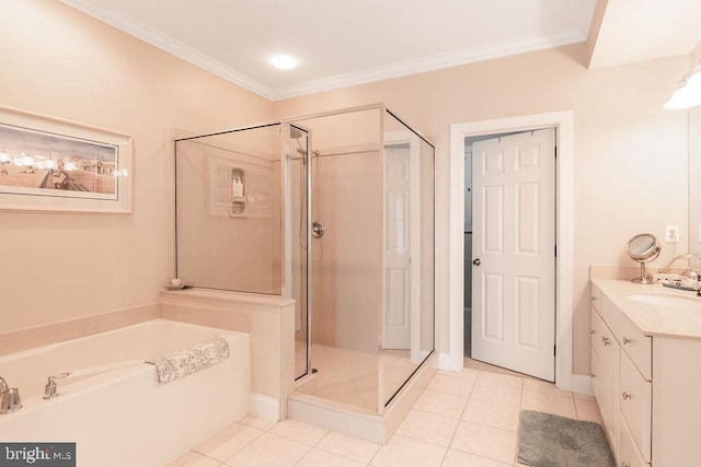 bathroom with vanity, crown molding, shower with separate bathtub, and tile patterned flooring