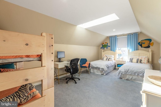 carpeted bedroom with lofted ceiling