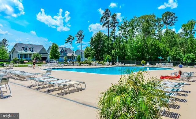 view of pool featuring a patio