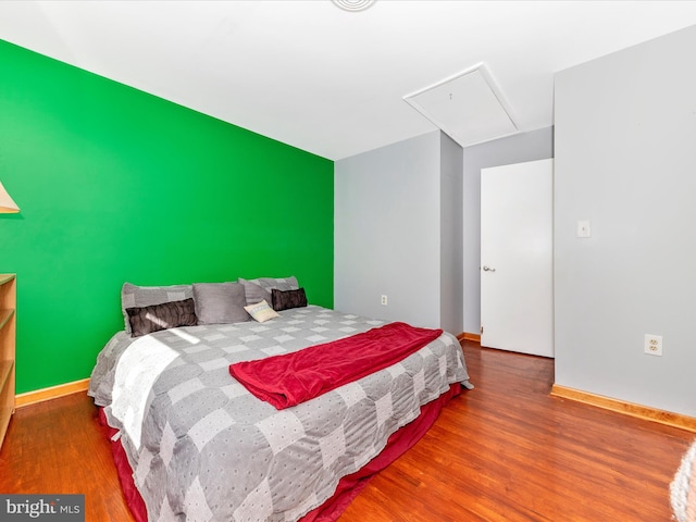 bedroom featuring hardwood / wood-style floors