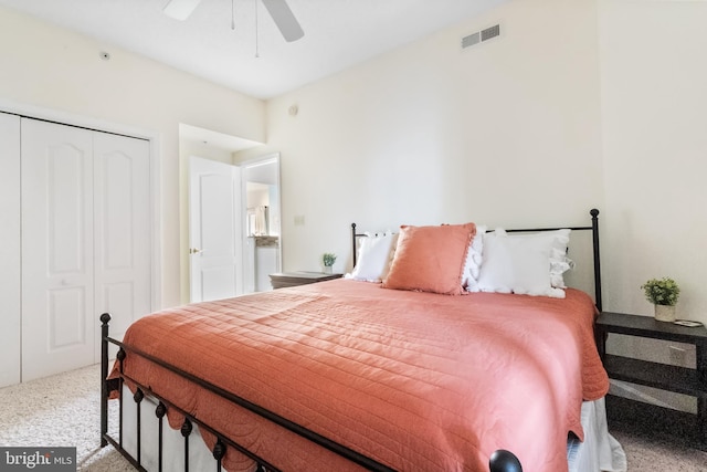 carpeted bedroom with a closet and ceiling fan