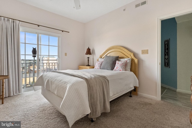 bedroom featuring carpet floors, access to outside, and ceiling fan