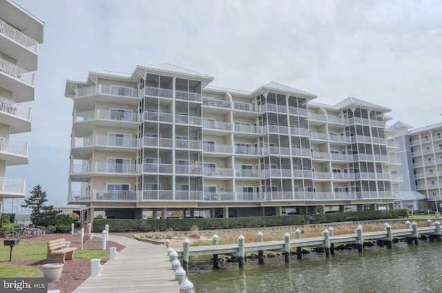 view of building exterior with a water view