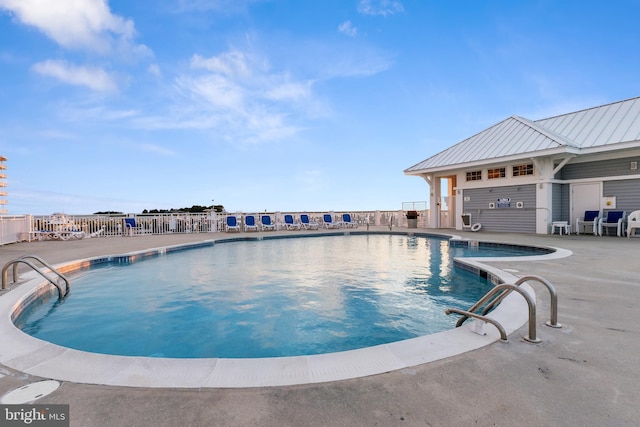 view of pool featuring a patio