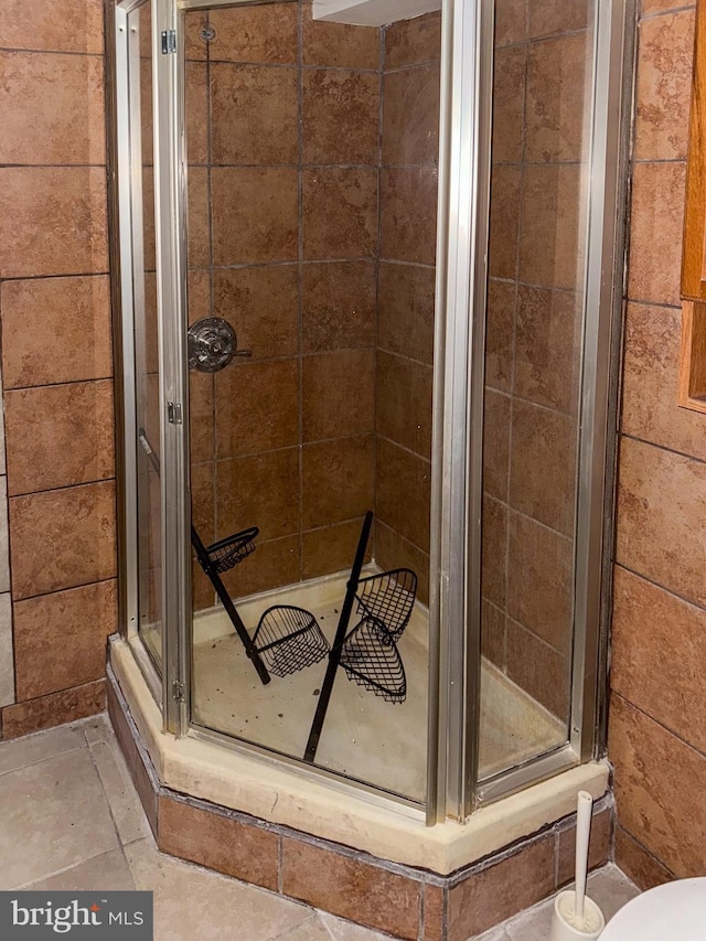 bathroom with an enclosed shower