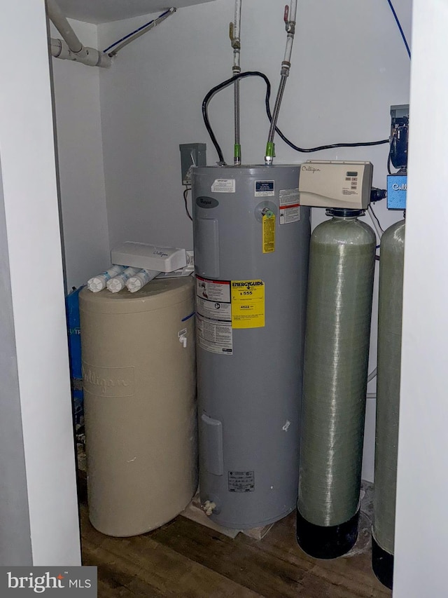 utility room featuring water heater