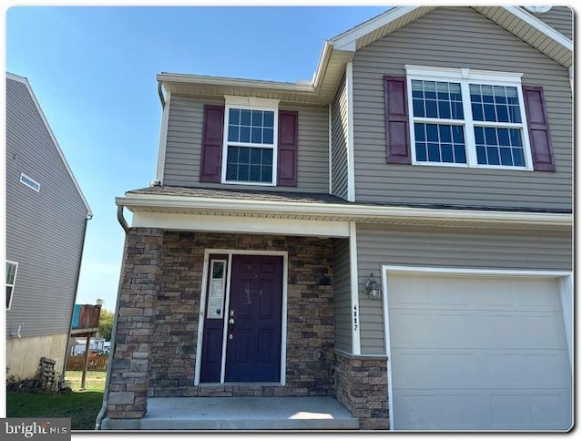 view of front of home with a garage