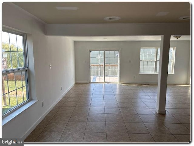 view of tiled spare room