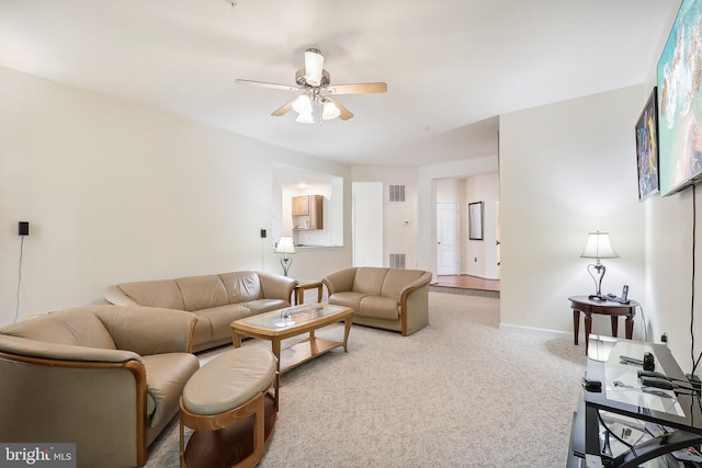 15303 Glastonbury Way, Upper Marlboro, MD 20774 - living room featuring a ceiling fan, carpet, and baseboards