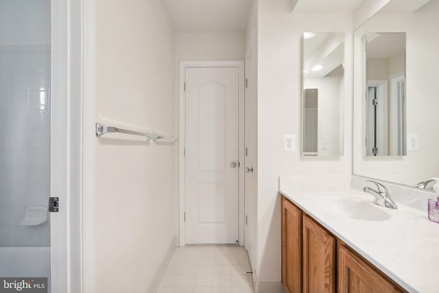 15303 Glastonbury Way, Upper Marlboro, MD 20774 - bathroom featuring double vanity, tile patterned flooring, and baseboards