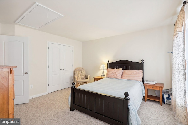 15303 Glastonbury Way, Upper Marlboro, MD 20774 - bedroom featuring carpet floors, a closet, attic access, and baseboards