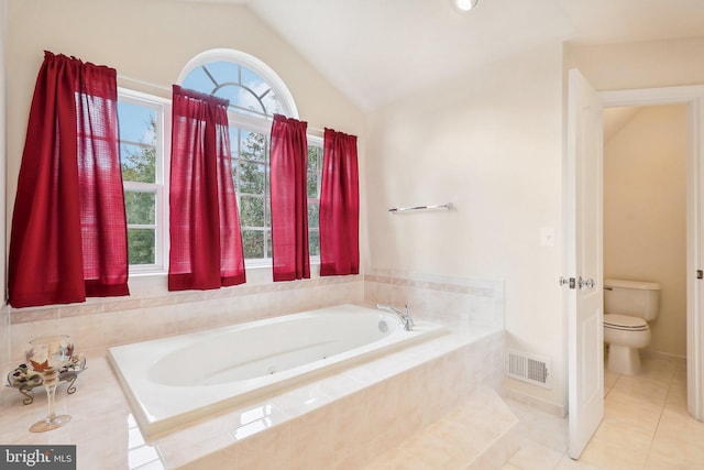 15303 Glastonbury Way, Upper Marlboro, MD 20774 - full bath featuring lofted ceiling, toilet, tile patterned flooring, and a bath