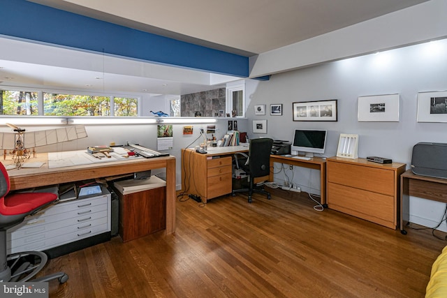 office with dark hardwood / wood-style flooring