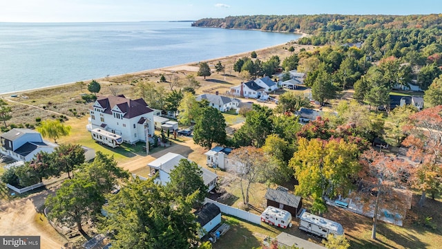 bird's eye view featuring a water view and a residential view