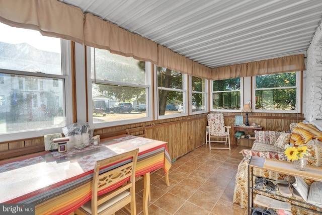 sunroom featuring tile patterned floors