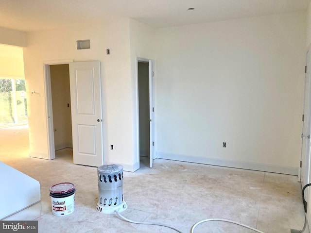 unfurnished bedroom with baseboards