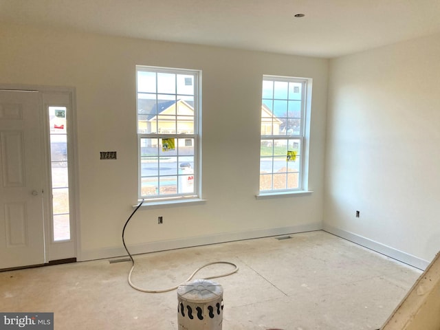 entrance foyer with visible vents and baseboards