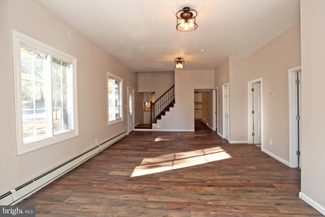 entryway featuring dark wood-type flooring and a baseboard radiator