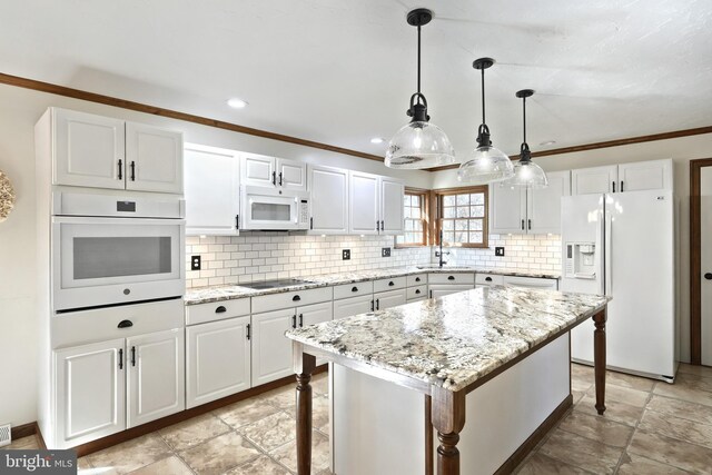 41 Howard Dr, East Berlin, PA 17316 - kitchen featuring white cabinetry, a kitchen bar, and white appliances
