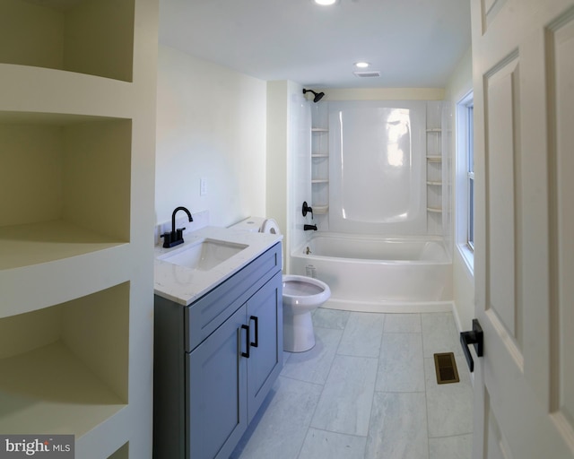 full bathroom featuring vanity, toilet, and shower / bathtub combination