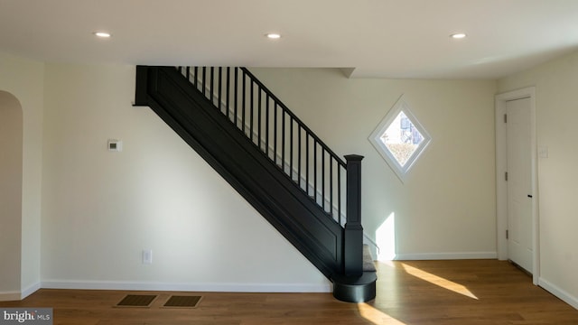 entrance foyer featuring hardwood / wood-style flooring