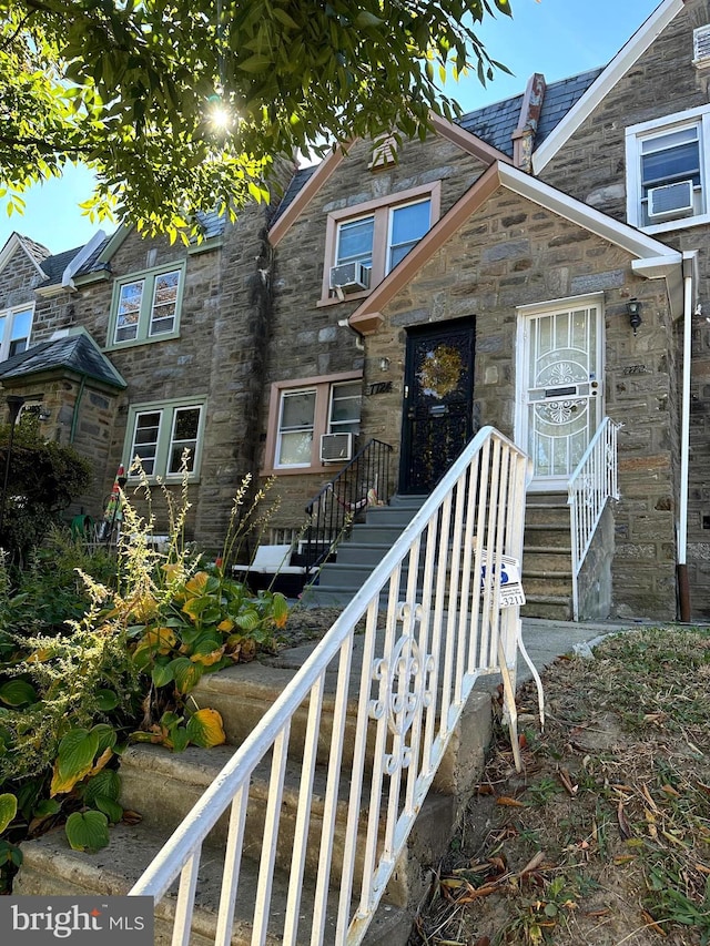 view of front of house with cooling unit