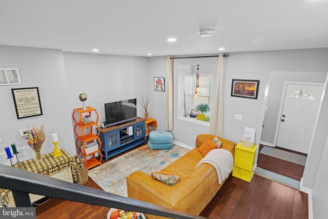 living room featuring dark hardwood / wood-style flooring