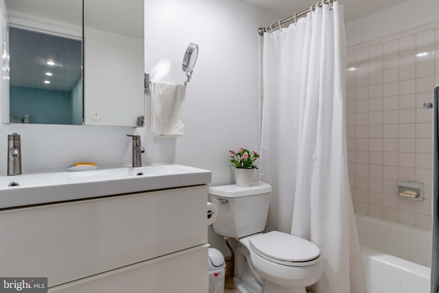 full bathroom with vanity, toilet, and shower / bathtub combination with curtain