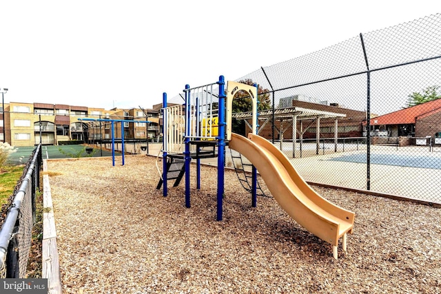 view of play area with tennis court