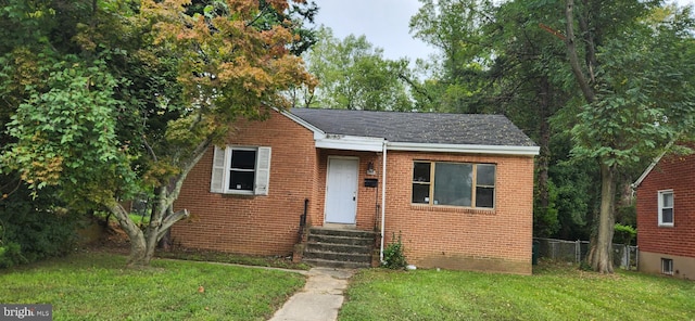 bungalow with a front yard