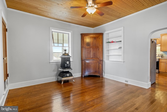 interior space featuring ornamental molding, dark wood-type flooring, and wood ceiling