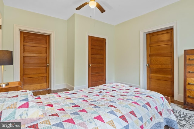 bedroom with ceiling fan and light hardwood / wood-style floors